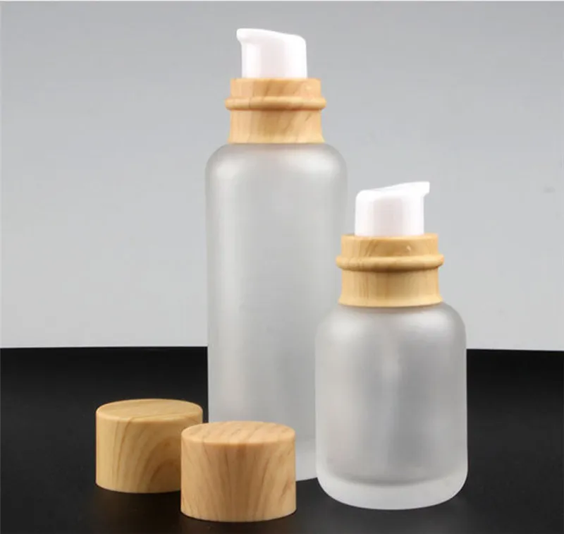 50ML 110ML 150ML Bottiglie di crema in vetro satinato Vasetti cosmetici rotondi Bottiglia per pompa per lozione per il viso con tappo con venature del legno