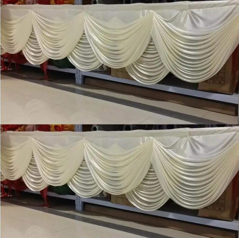 トップスタイルの白い結婚式のカーテンスワッグアイスシルク背景カーテンスワグの梯子滴テーブルスカートテーブル布の装飾