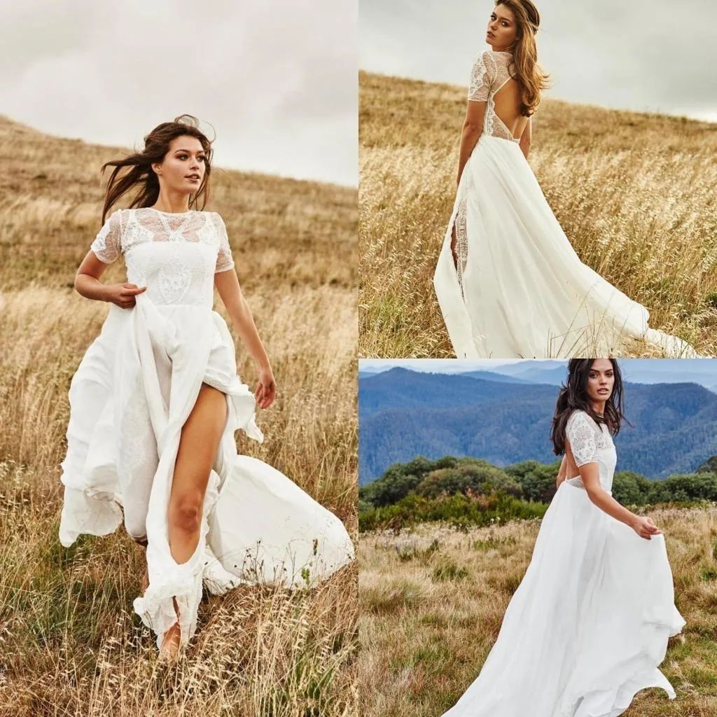 2021 Abiti da sposa Boho Una linea Backless Maniche corte Pizzo Gioiello Collo Fessura laterale Abito da sposa country su misura vestido de novia