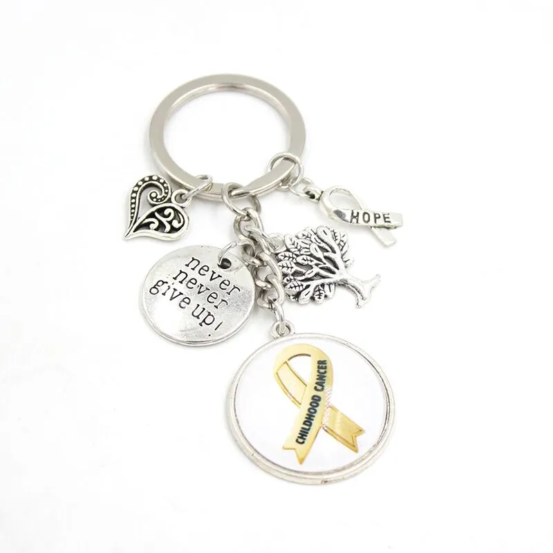 Nouvelle Arrivée En Gros Or Ruban Cabochon Imprimé Enfance Cancer Sensibilisation Bijoux Coeur Amour Espoir Charmes Porte-clés Porte-clés Cadeaux