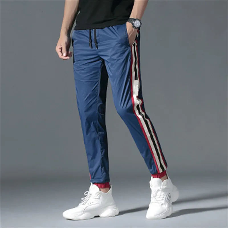 Man trekkoord slanke broek mode trend merk brief patroon ademende broek ontwerper mannelijke zomer flimsy hip hop sport traight broek