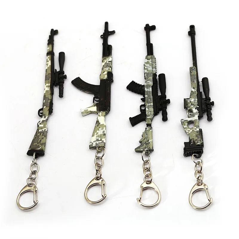 Nyckelringar playerunknowns slagfält nyckelring pubg 12cm pistol modell nyckelkedja ringhållare portachiavi porte klaff män smycken souvenir