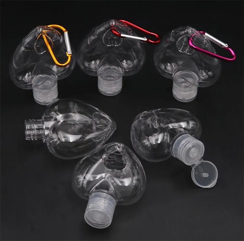 50ml forma coração forma sanitizer garrafa com chaveiro anel gancho claro plástico recipientes recipientes de viagem frasco da986