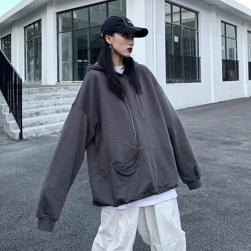 Girl in online oversized hoodie