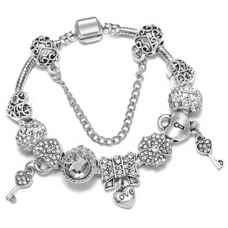 Sier Fashion Sterling Love Bowknot Heart Locker Key Murano Lampwork Glass Europeiska pärlor Crystal Dingle Passar Charm Armband Halsband B8