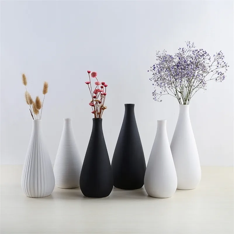 Simples moderno branco cerâmico / preto vaso sala de estar mesa decoração artificial flores secas de flores Decoração de casa presente LJ201208