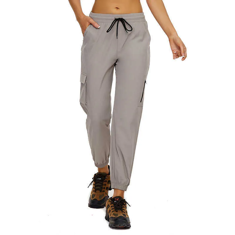 Açık Koşu Spor Çabuk Kuruyan Pantolon Yoga Kıyafetleri Kadın Tayt Tarzı Eğlence sporları dört elastik dokuma dağcılık pantolonu