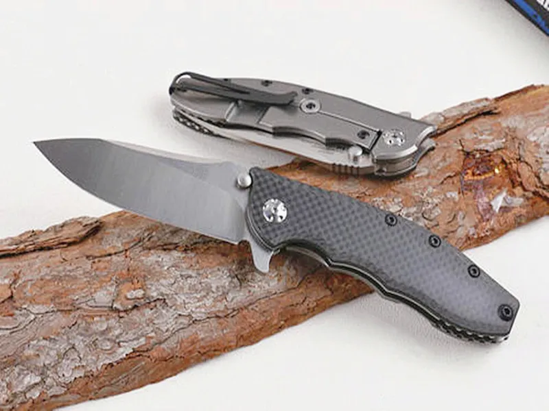 Offerta speciale High End 0562CF Coltello flipper D2 Drop Point Lama stone wash Rondella con cuscinetti a sfera Coltelli tascabili EDC con scatola al minuto