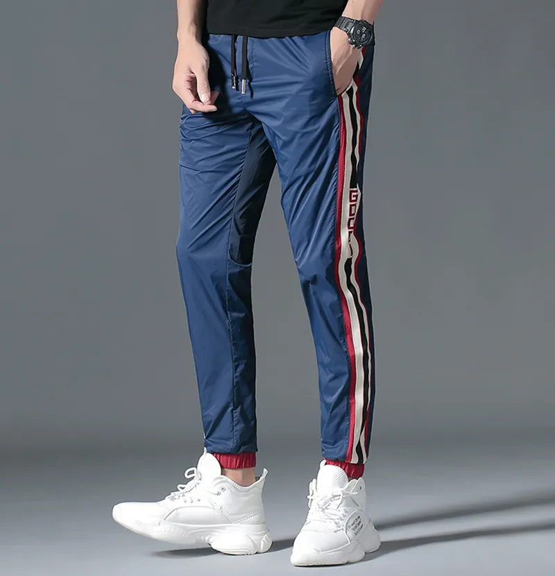 2021 Mens Breathable Jogger Pants New Drawstring Sports Track Pants Men Street Fashion Side Stripe Designer Joggers Casual Trousers M-5XL