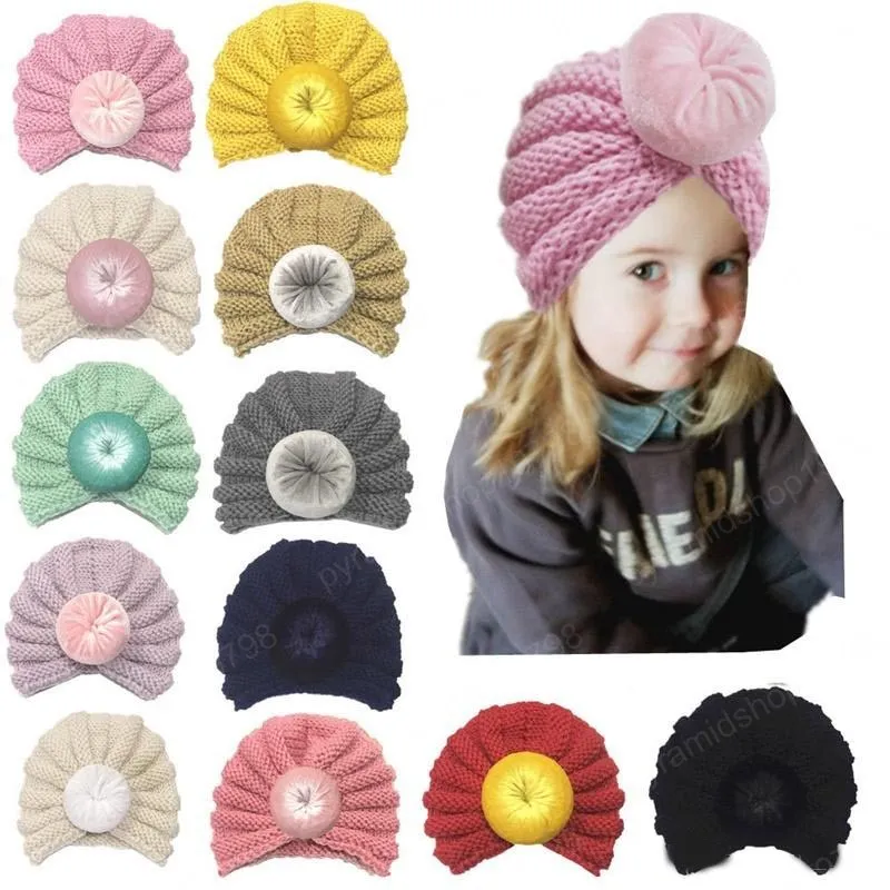 Flicka stickade kepsar med boll spädbarn baby solid färg turban hattar våren höst beanie 12colors väljer