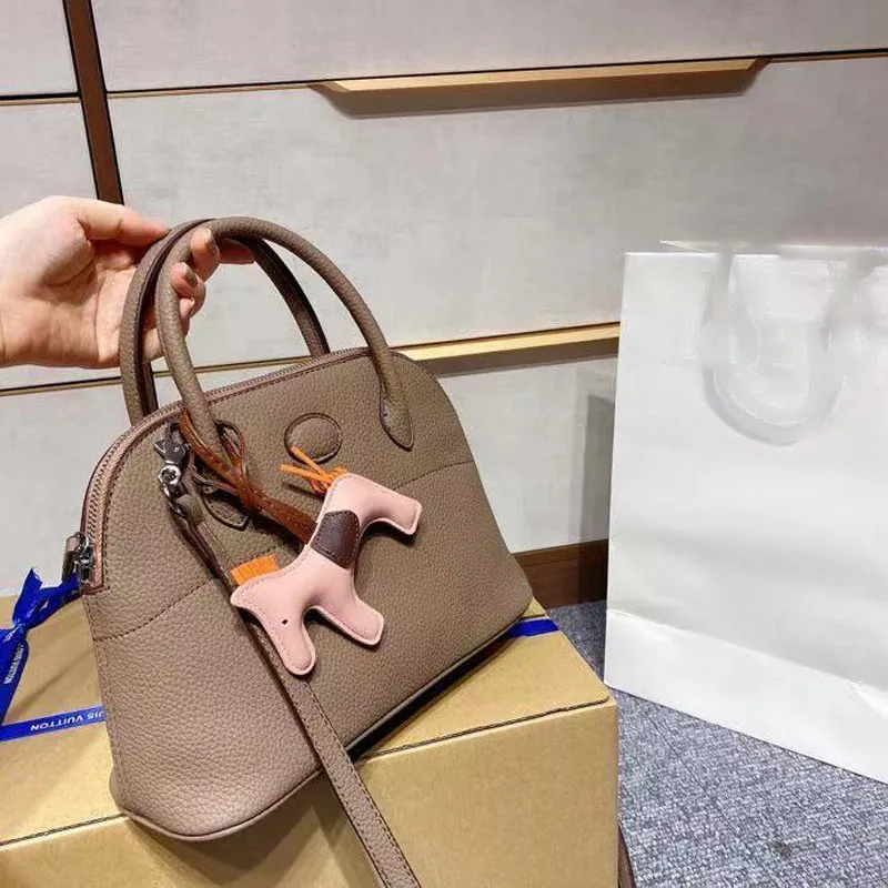 low key simple and practical personal taste womens fashion bag shopping bag art zipper free pendant womens fashion handbag