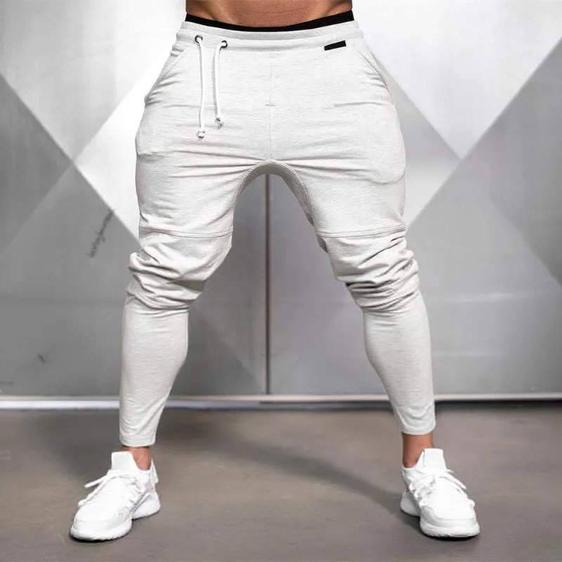 Pantalon Cargo Jogging Homme Sweatpants Coupe Ajustée, Respirants Extensible Pantalon de Sport Bas de Survêtement pour Sport, Loisirs, Fitness, Randonnée Pantalons de Course à Pied Tapered