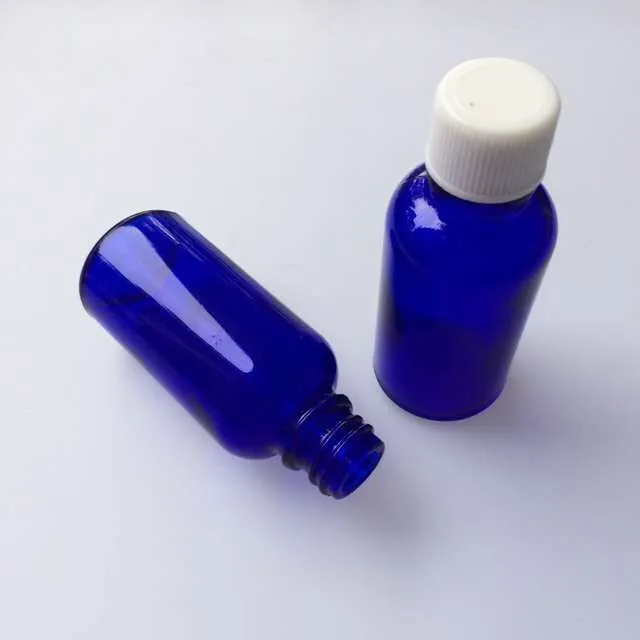 Glass Liquid Medicine Bottles with White Cap Sealing up Packing Liquid Bottles Essential Oil Jars2