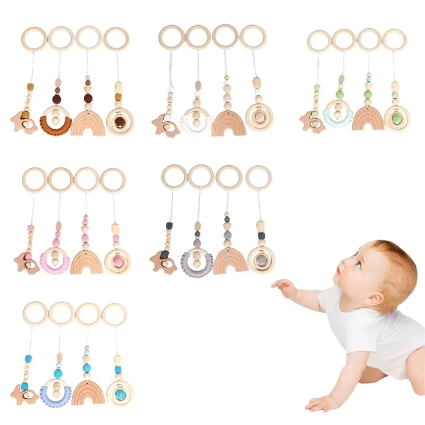 4 st / set baby play gym ram barnvagn hängande hängen trä ring teether molar tandvård nursing rattle leksaker gåvor spädbarn rum 220216