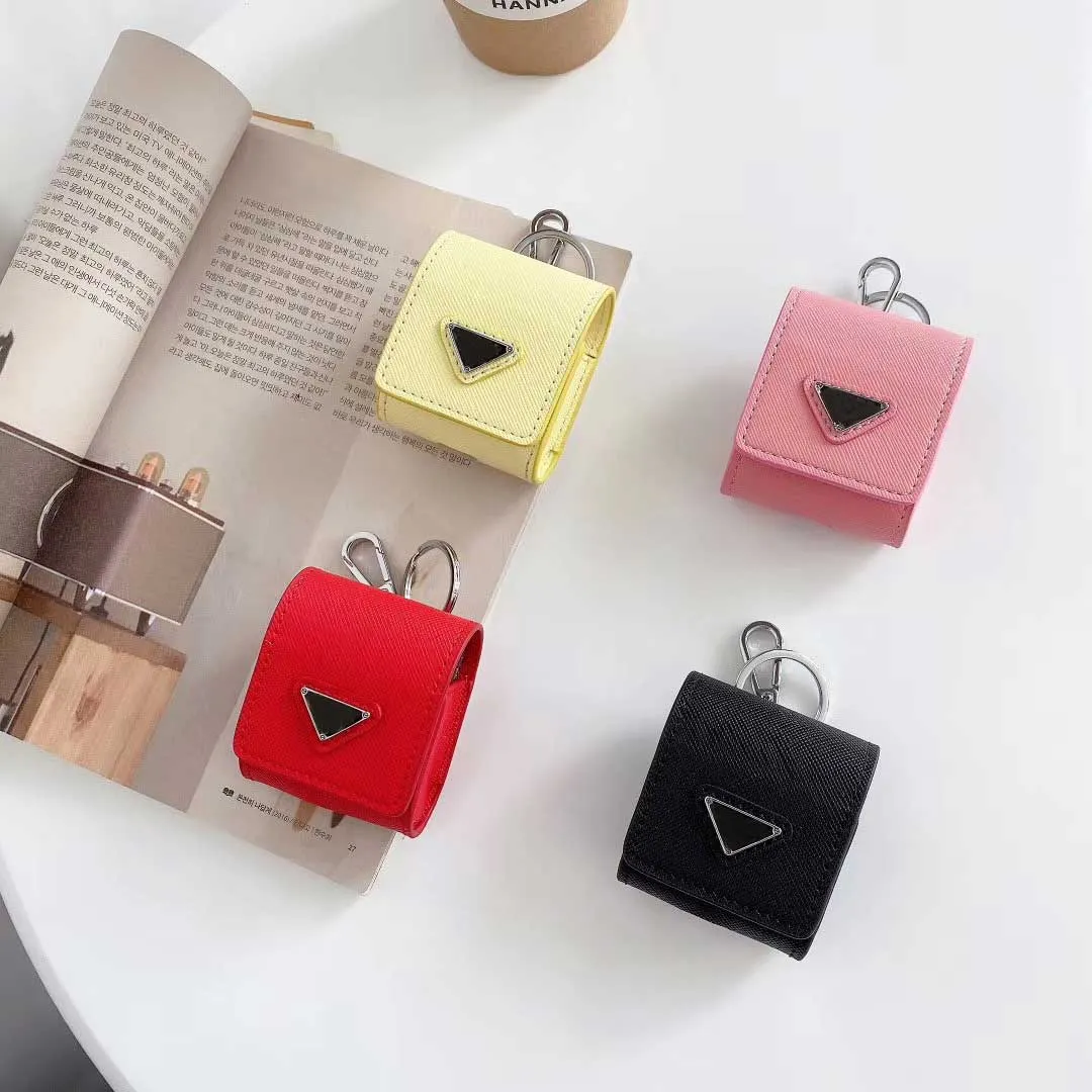 Fashion Stylist Airpods Case Backpack Style 4 Colors Pacchetto Airpods con motivo a triangolo invertito con portachiavi