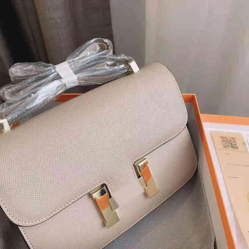 브랜드 H 가방 핸드백 가방 Herme 여성의 순수 가죽 레트로 플립 싱글 숄더 가방 고용량 메신저 디자이너 H Yue