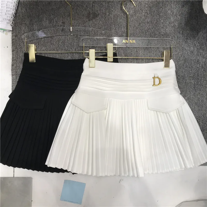 Mini gonne da ballo a pieghe traspiranti bianche stile preppy da donna nuova gonna corta gonfia con cuciture tascabili a vita alta primavera estate