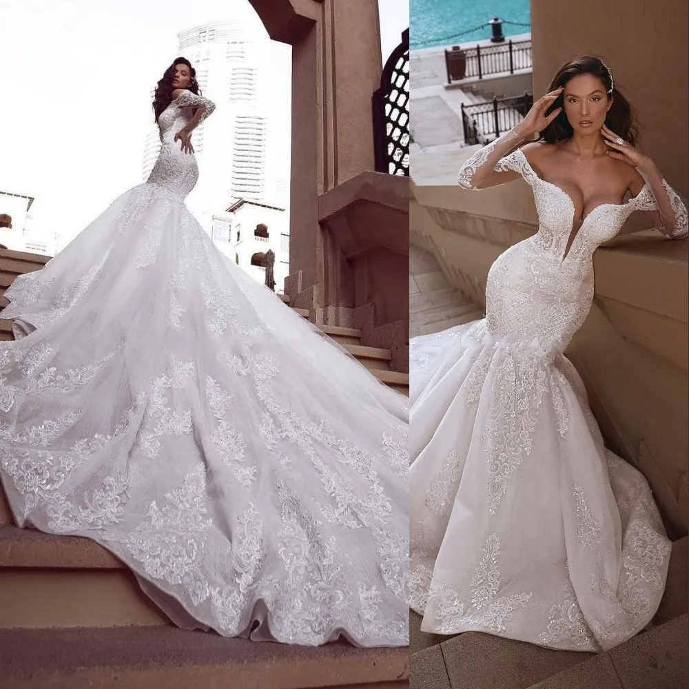 2021 Nieuwe Mermaid Kant Trouwjurken Sheer Pluming Neck Lange mouwen Crystal Beaded Bridal Jurken Plus Size Lovertjes Trumpet Bruidsjurken