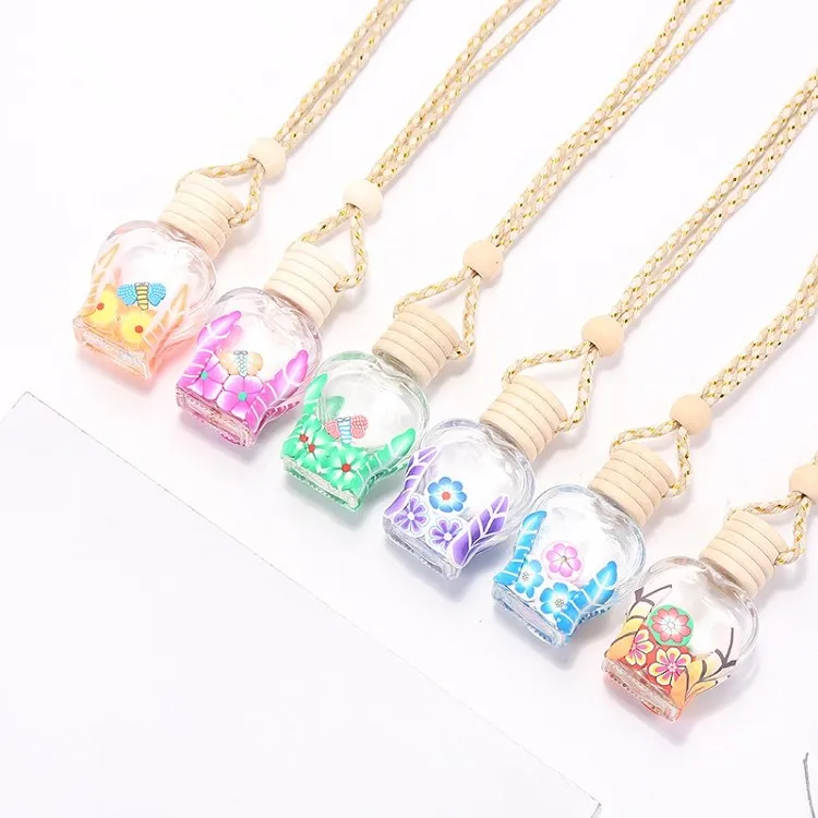 hot Colorful Car Perfume Bottle Pendant Essential Oil Diffuser Ornaments Air Freshener Pendant Empty Perfume Glass Bottle Gift T2I51647