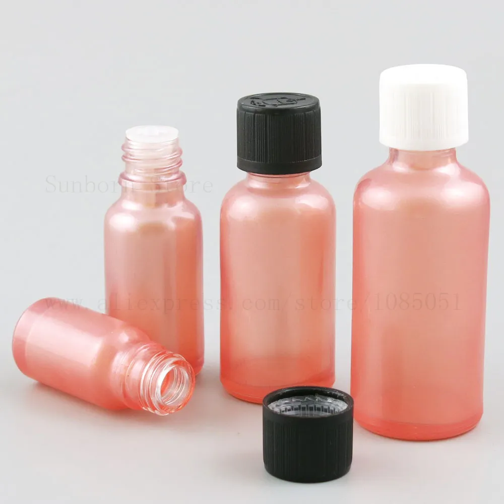 Garrafa de vidro rosa de pintar com redutor de orifício e tampa Pequenos frascos de óleo essencial e frascos líquidos 10ml 30ml 50ml 100ml 500pcs