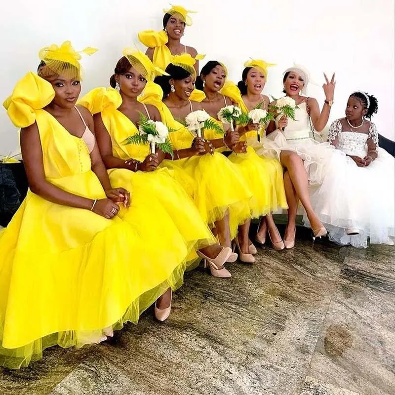 Yellow Tea Length lemon Yellow bridesmaid dresses with Spaghetti Straps, Ruffles, and Buttons - A-Line Tulle Gown for African Plus Size Maid of Honor