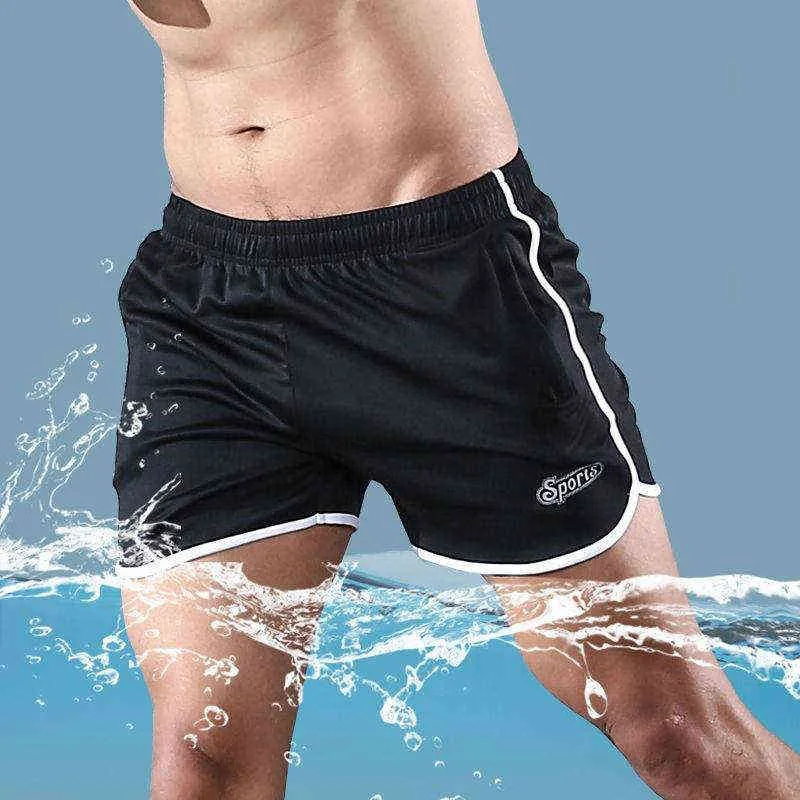 Homens / Mulheres Sport Shorts Roupa de verão Ginásio Fitness Shorts Masculino Casual Elastic Cintura Corrida de Corrida Homme Sweatpant Plus Size G220223