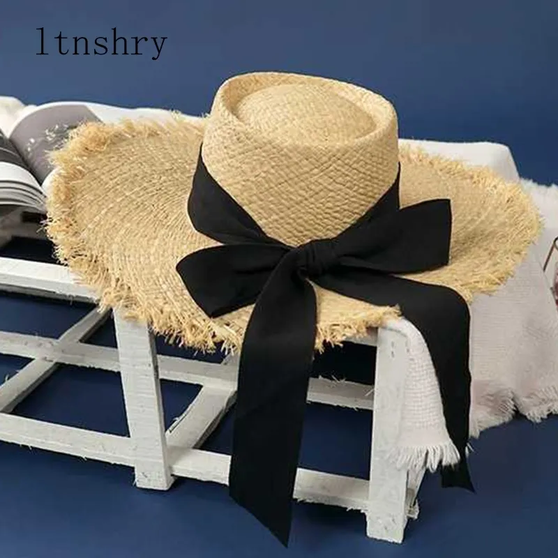 Novo chapéu de fita branca de praia de praia de verão Lady Lady Bow Raffia Hat temperamento Chapéus de palha planos Chapéu de praia do mar feminino Y200602