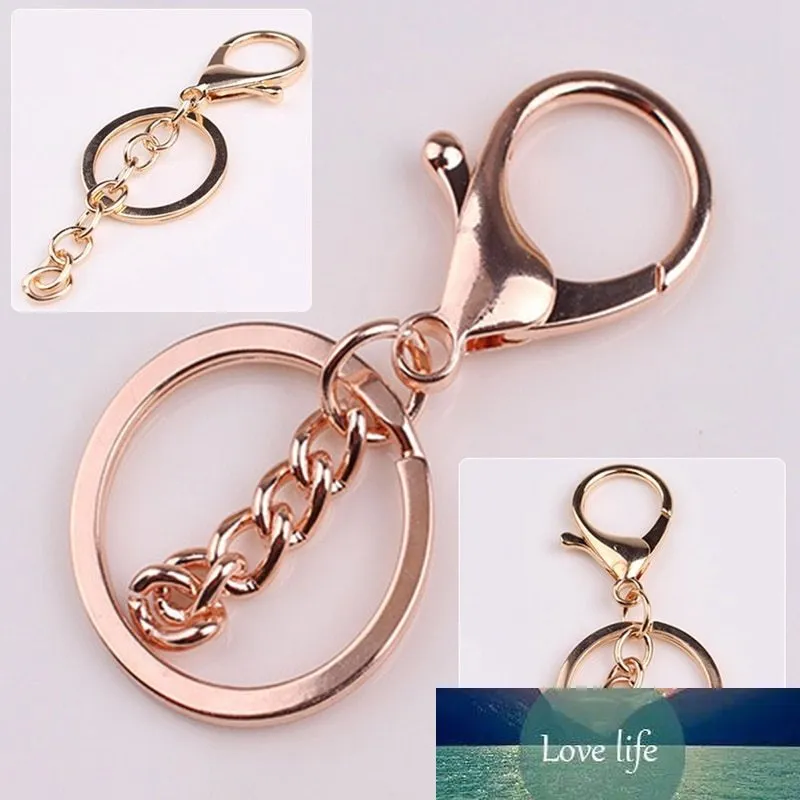 Högkvalitativ mode guld nyckelringar Ring DIY smycken gör tillbehör delar väska charms bil nyckelring nyckelring trinket