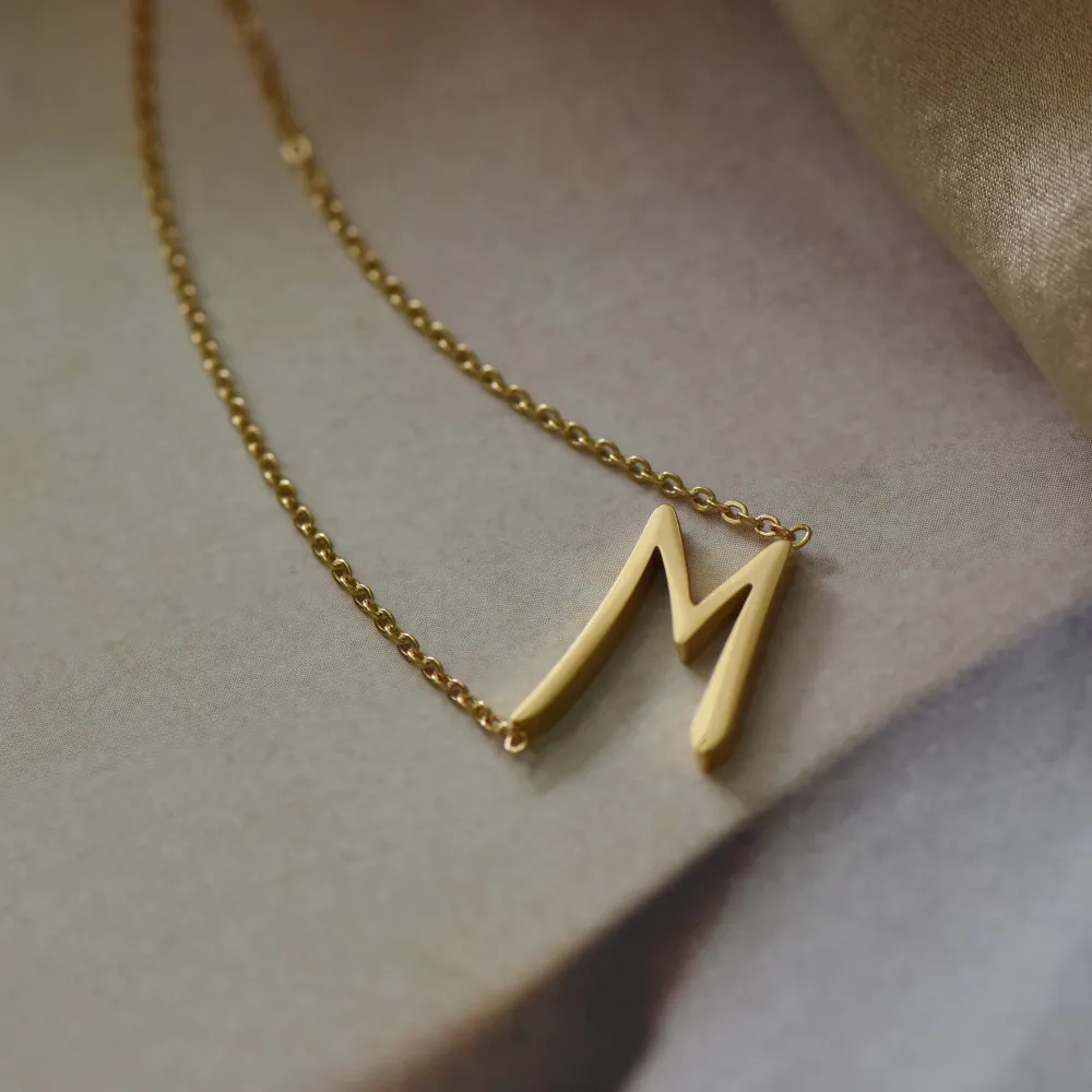 Титана с 18K Gold Papery M цепи ожерелье из нержавеющей стали дизайнер T показов взлётно-посадочной полосы платья редкость япония корейский бого готический Q0531