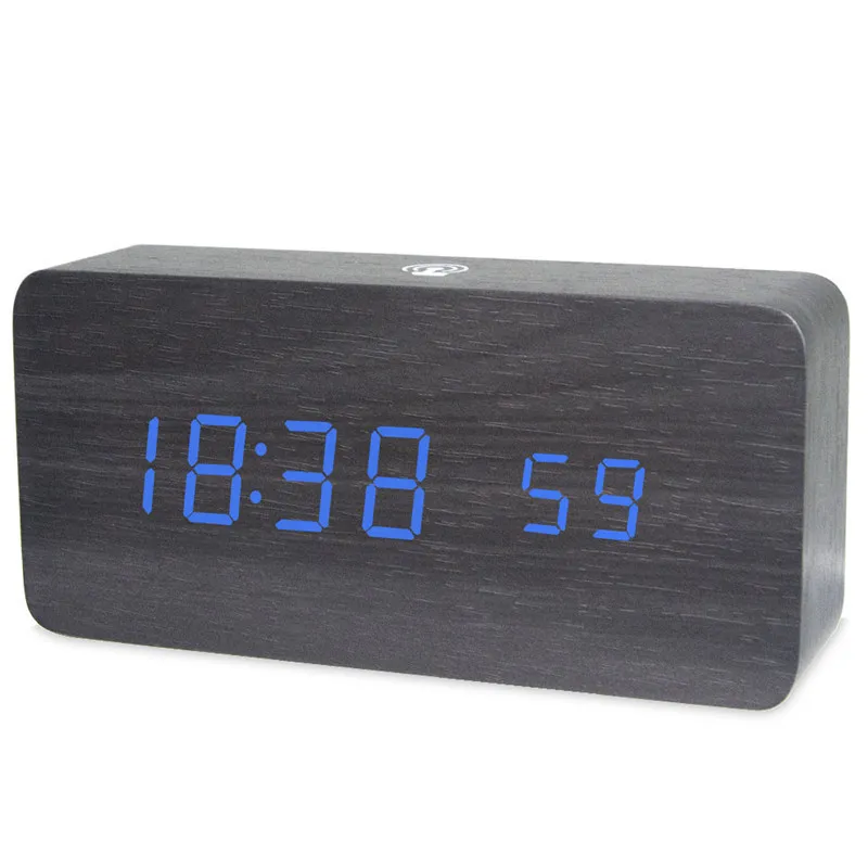 Reloj despertador digital moderno con signo de despertador sobre un fondo  blanco.
