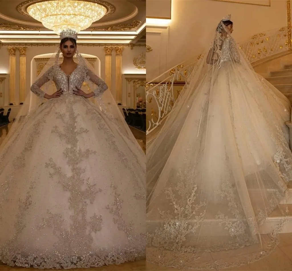 Dubai Arabo Ball Gown Abiti da sposa 2021 Maniche lunghe di lusso Appliqued Pizzo Perline di cristallo Abiti da sposa Scollo a V Vestidos De Novia AL7517