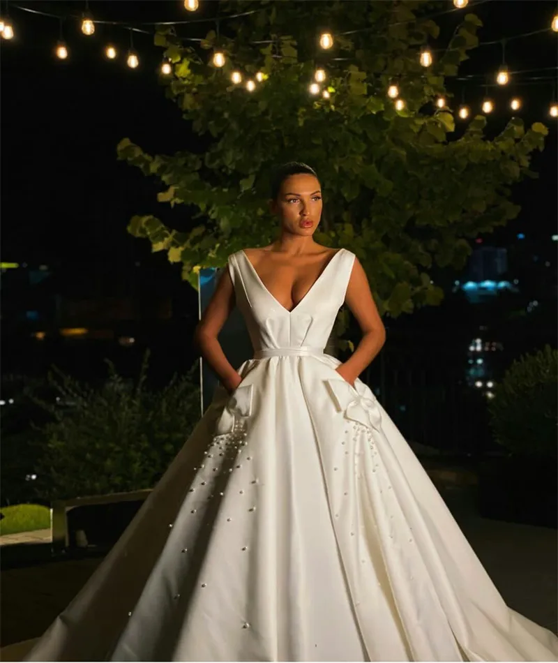 A Line V Neck Satin Wedding Dress with Bow Beads and Sweep Train Bridal Gown from Dhgate A-Line Wedding Dresses - price 120.88 A Line V Neck Satin Wedding Dress with Bow Beads and Sweep Train Bridal Gown from Dhgate A-Line Wedding Dresses - price 120.88