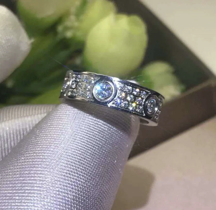 Full Diamant Titan Stål Silver Kärlek Ring Män Kvinnor Rose Guld Ringar Älskare Par Designer Ringar Smycken present