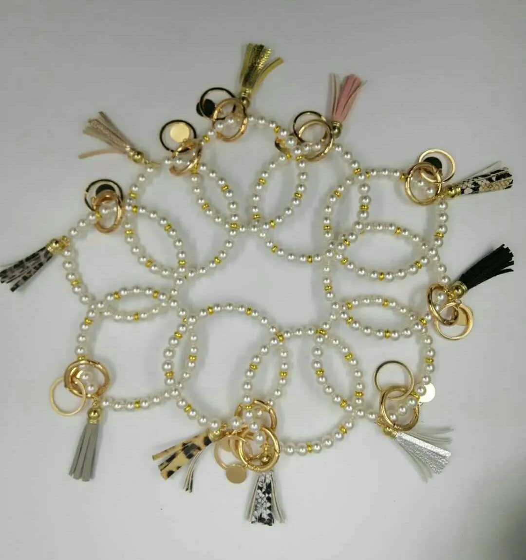 European and American Creative Fashion Pearl Bracelet Keychain Serpentine Tassel Copper Pendant Keyring