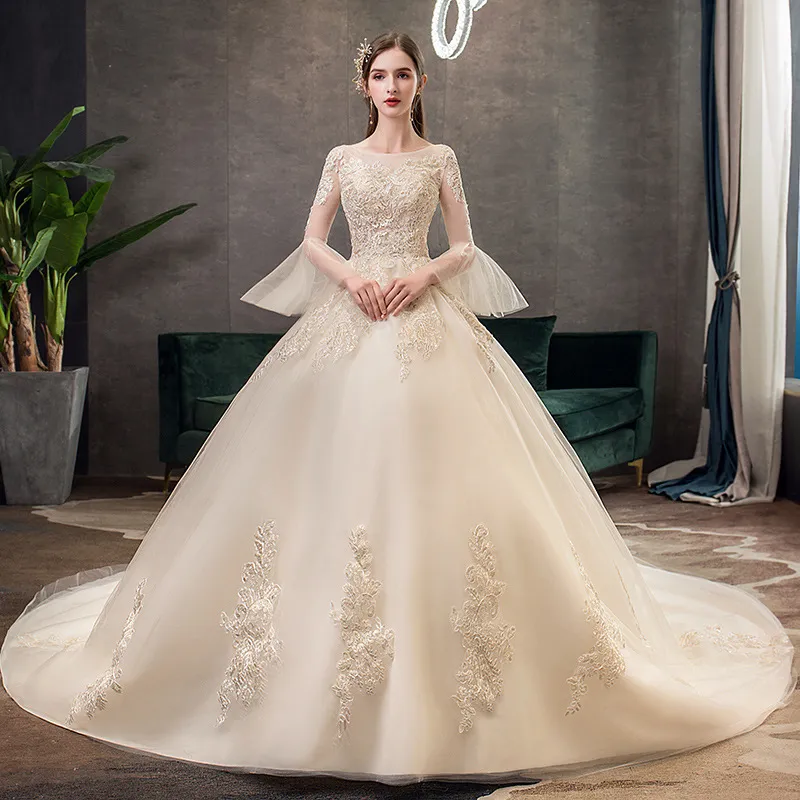 Główna suknia ślubna 2022 Jesień i zima Nowy Slim Champagne Tail Dream Bride Duży rozmiar Długi Rękaw Koreański
