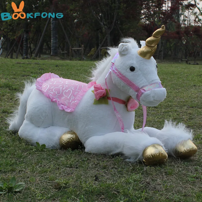 Peluche licorne couchee 85 cm, peluche