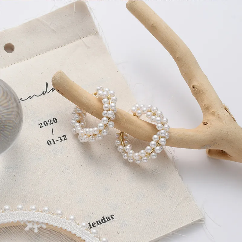 S925 silver needle European and American temperament atmosphere pearl circle earrings exaggerated hand-woven retro fashion earring earrings