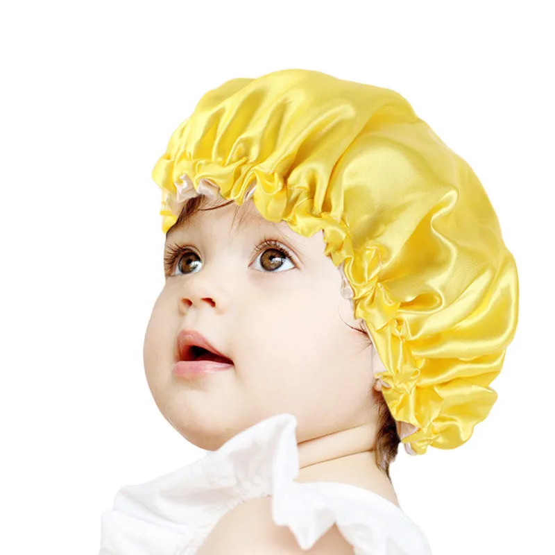 Nieuwe aankomst zachte zijdeachtige kinderen ruches satijn bonnet haarverzorging snoep kleuren grote cap hoofd cover losse slaap hoed met elastische riemen