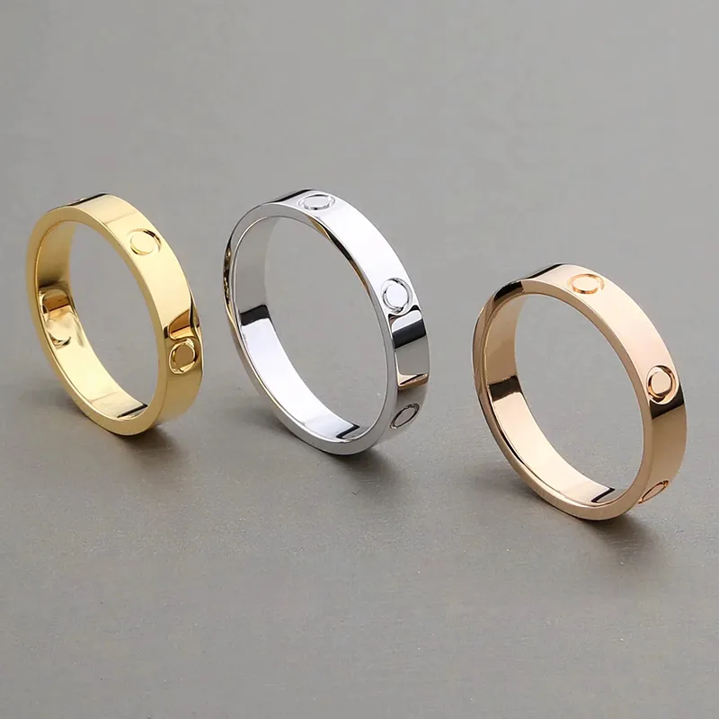 Mode Designer Ring Classic Rostfritt Stål Smycken Guld Kärlek Gift Förlovning Par Ring för Kvinnor Män