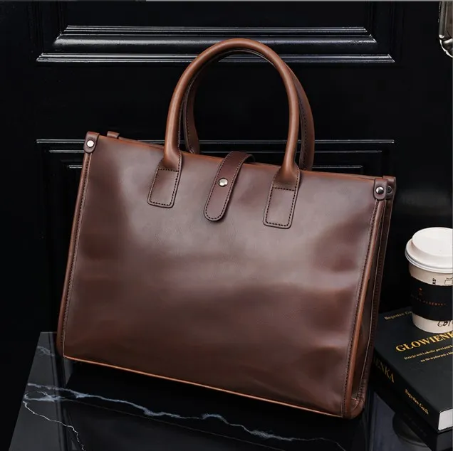 Homens Pasta de couro de luxo Mulheres Mulheres Laptop Bag Office Grande Handbag Capacidade Masculina ombro bolsas