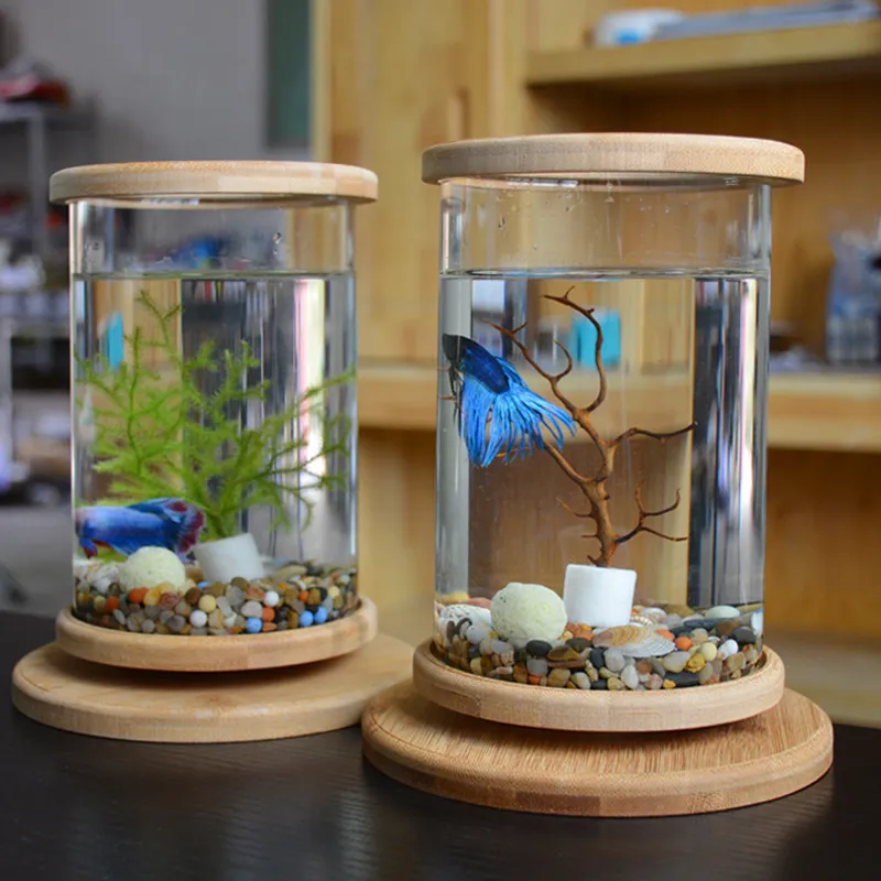 1pcs Glass Betta Fish Tank Bamboo Base Mini Fish Tank Decoration Accessories Rotate Decoration Fish Bowl Aquarium Accessories Y200917