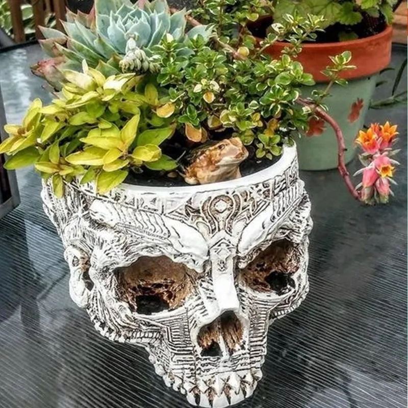 hand-carved-skull-flower-pot-1_f9e7f721-d7c6-4283-af87-e3f789925f4a_grande
