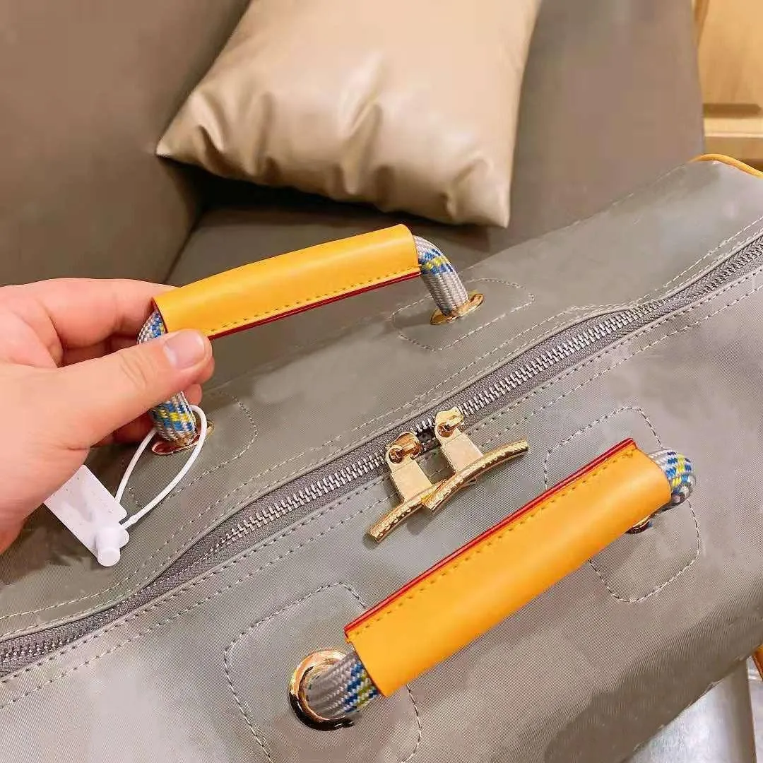 Luxury Waterproof Laser Hand Luggage Travel Duffel Duffle Bag For Men And Women Tote Handbag Backpack Duffle Bag And Handbags For Boys And Girls From Chengguodong1234 60.76 DHgate.Com