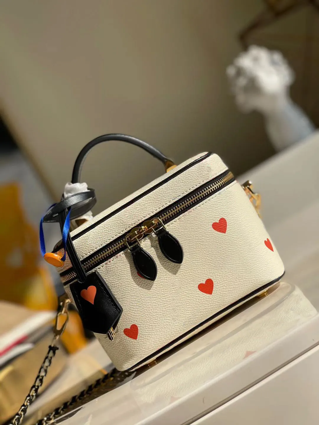 M57482 Spel på Vanity PM Bag med blommor i ljusblå och röd handväska handväska kvinnor kohude läder duk fåfänga fodral crossbody axel axel