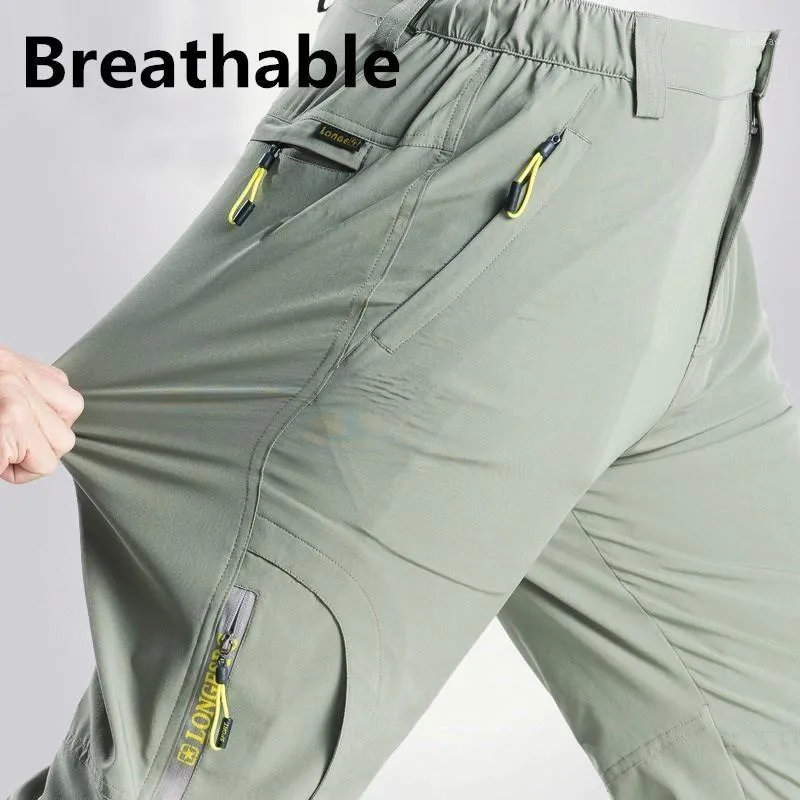 Calça de caminhada ao ar livre masculina elástica de secagem rápida à prova d'água softshell respirável homem acampamento pesca calças esportivas1