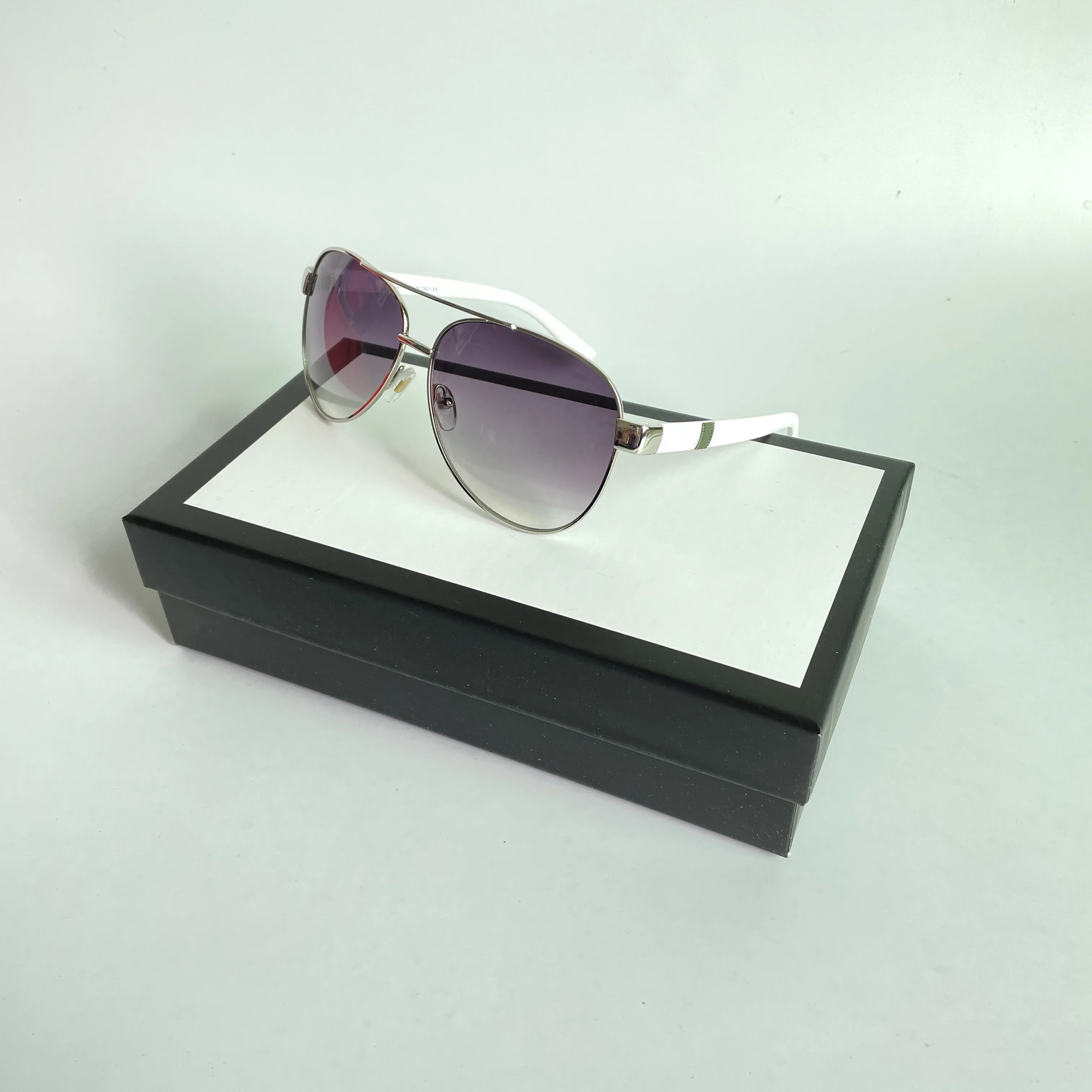 Óculos de sol de designer de luxo para homens e mulheres verão metal vintage driver óculos de sol proteção uv400 com caixa