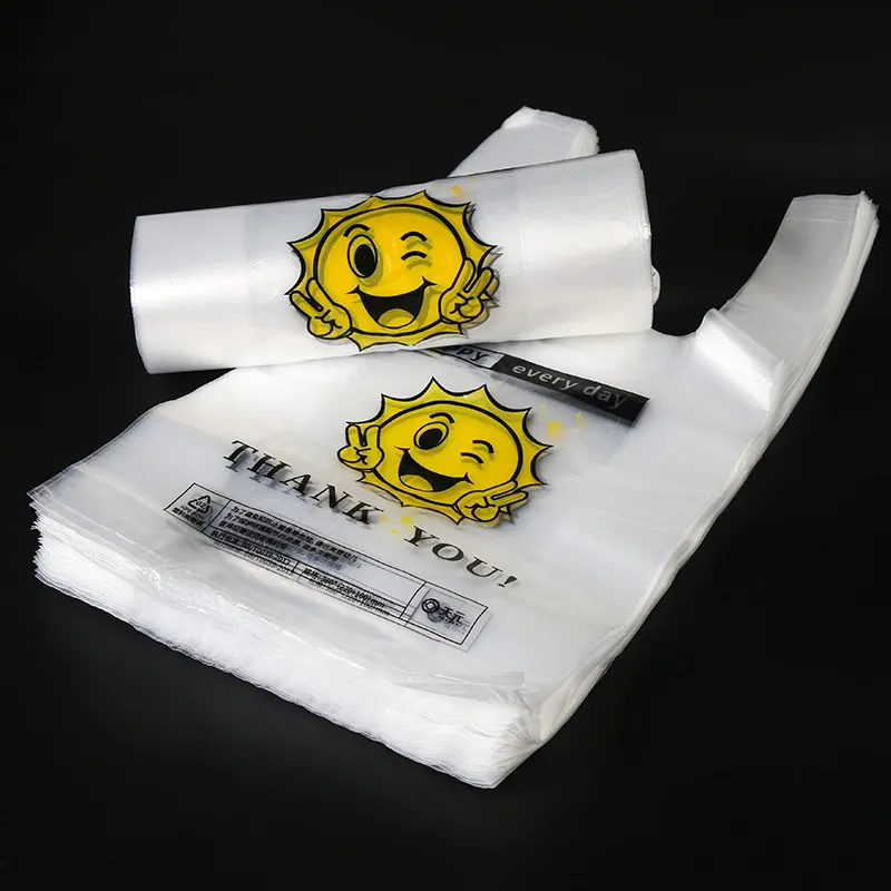 50 unids/pack transparente cara sonriente estilo chaleco bolsa de embalaje supermercado compras portátil Biodegradable bolsa de plástico para frutas para llevar