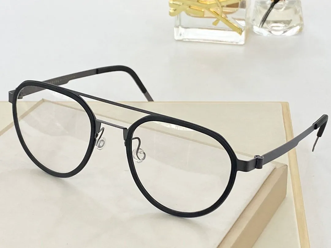 New Brand design ultra light titanium glasses high quality men's spectacles women's glasses ultra light no screw design eyeglass frame 9745