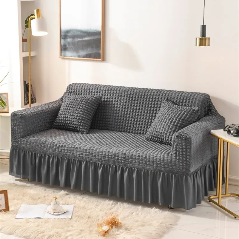 居間のためのソリッドカラーの弾性ソファーのカバープリントされた格子縞の伸縮断面スリッコーのソファーソファのカバーl字形1-4シアターLJ201216