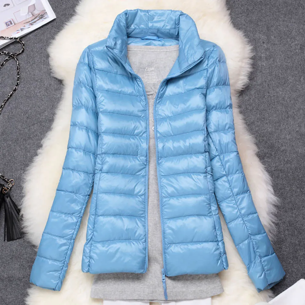 Manteau femme plume de canard sale